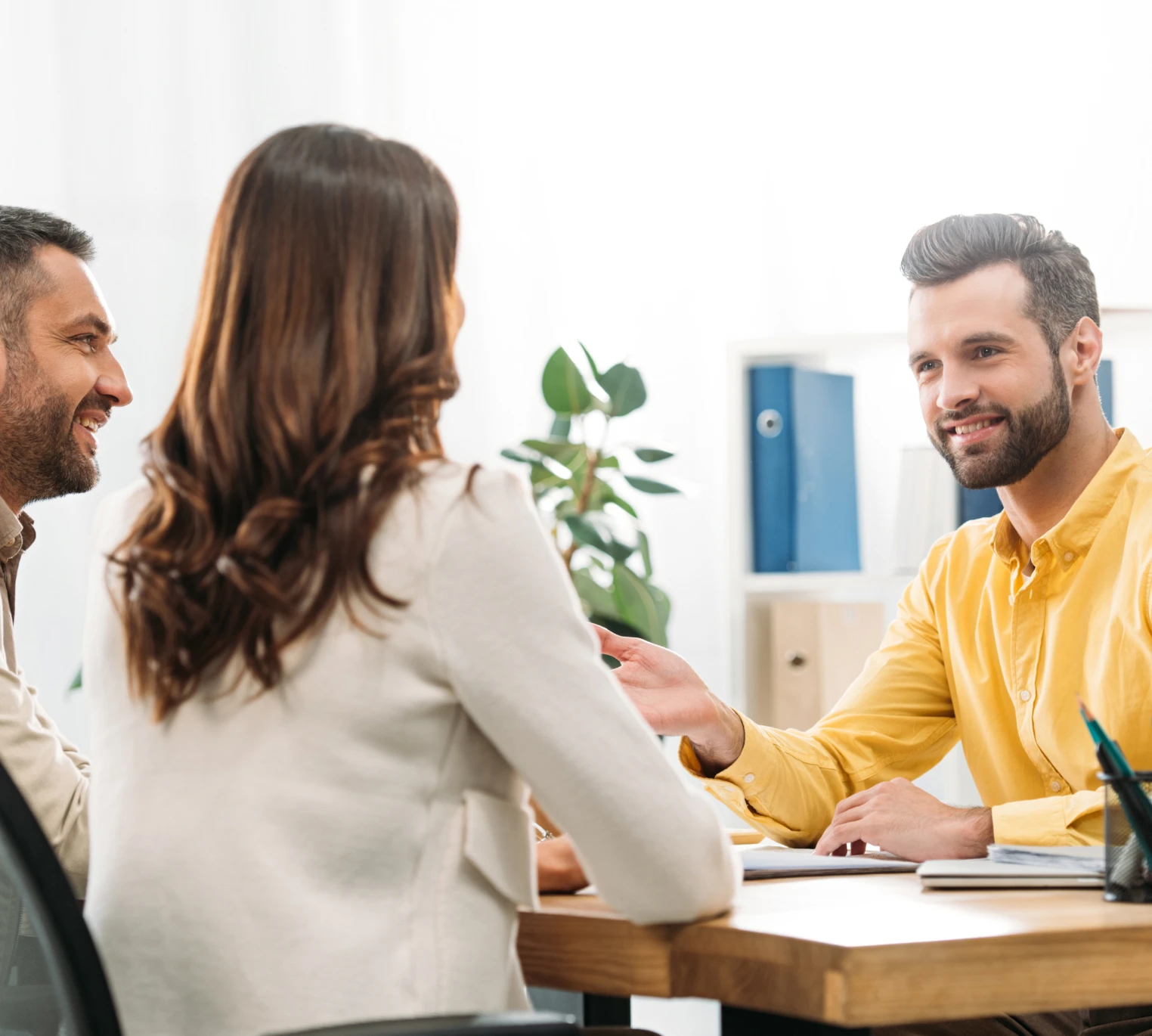 a group of people sitting at a table